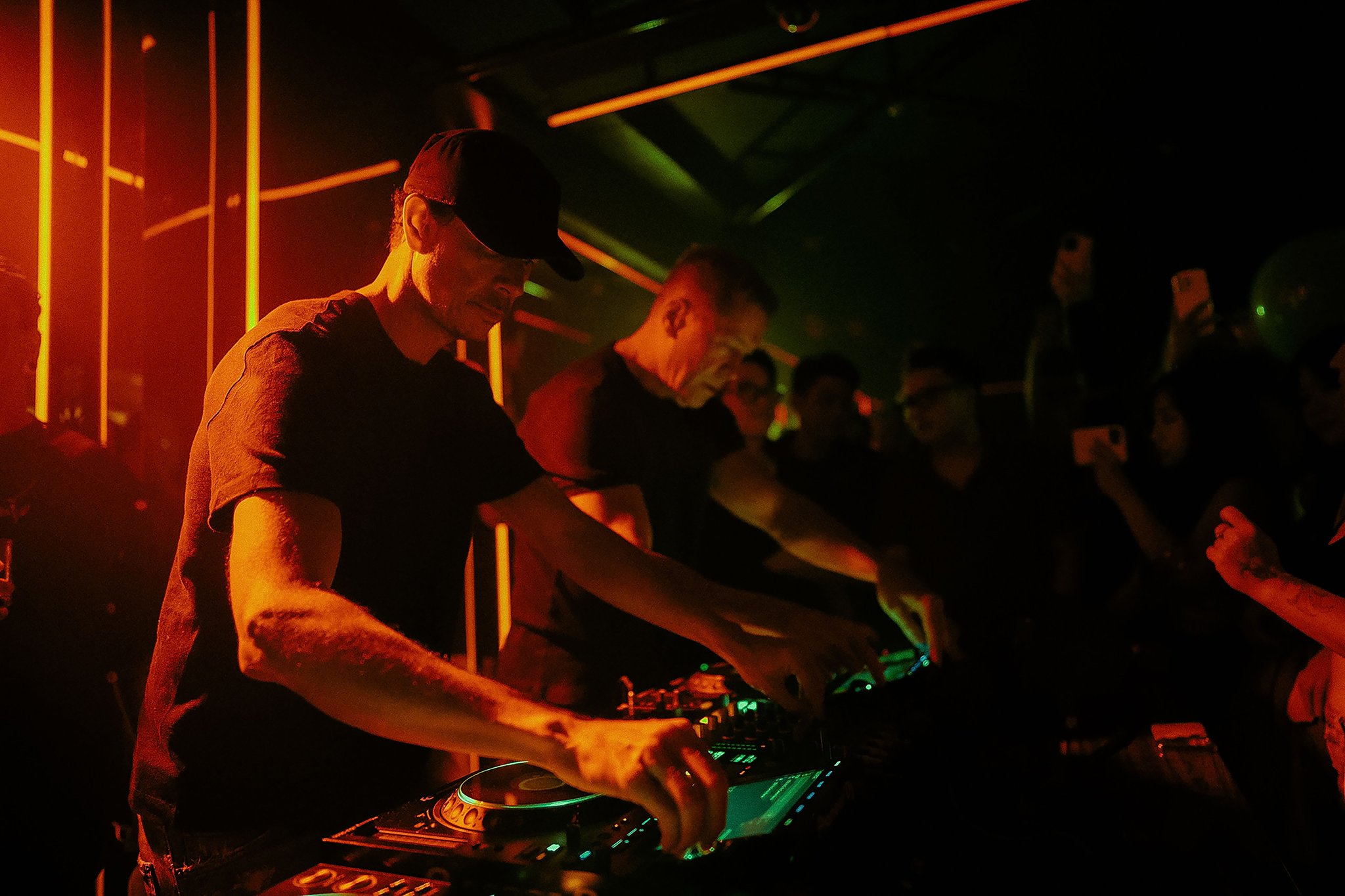 Berlin electronic music venue crowd in low light